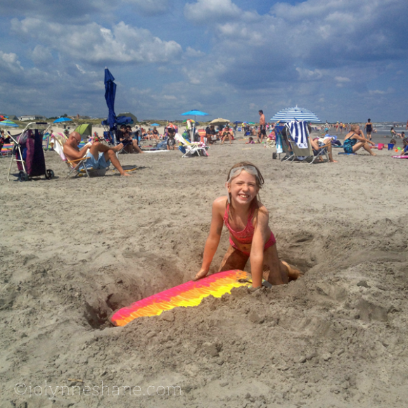 playing in the sand in Avalon, NJ