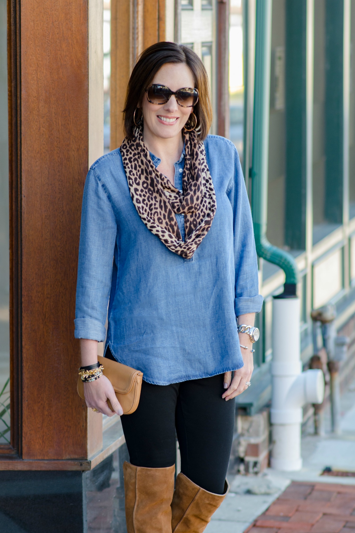 Thanksgiving Outfit Idea: Chambray Shirt and Leopard Scarf with Leggings and brown Over the Knee Boots