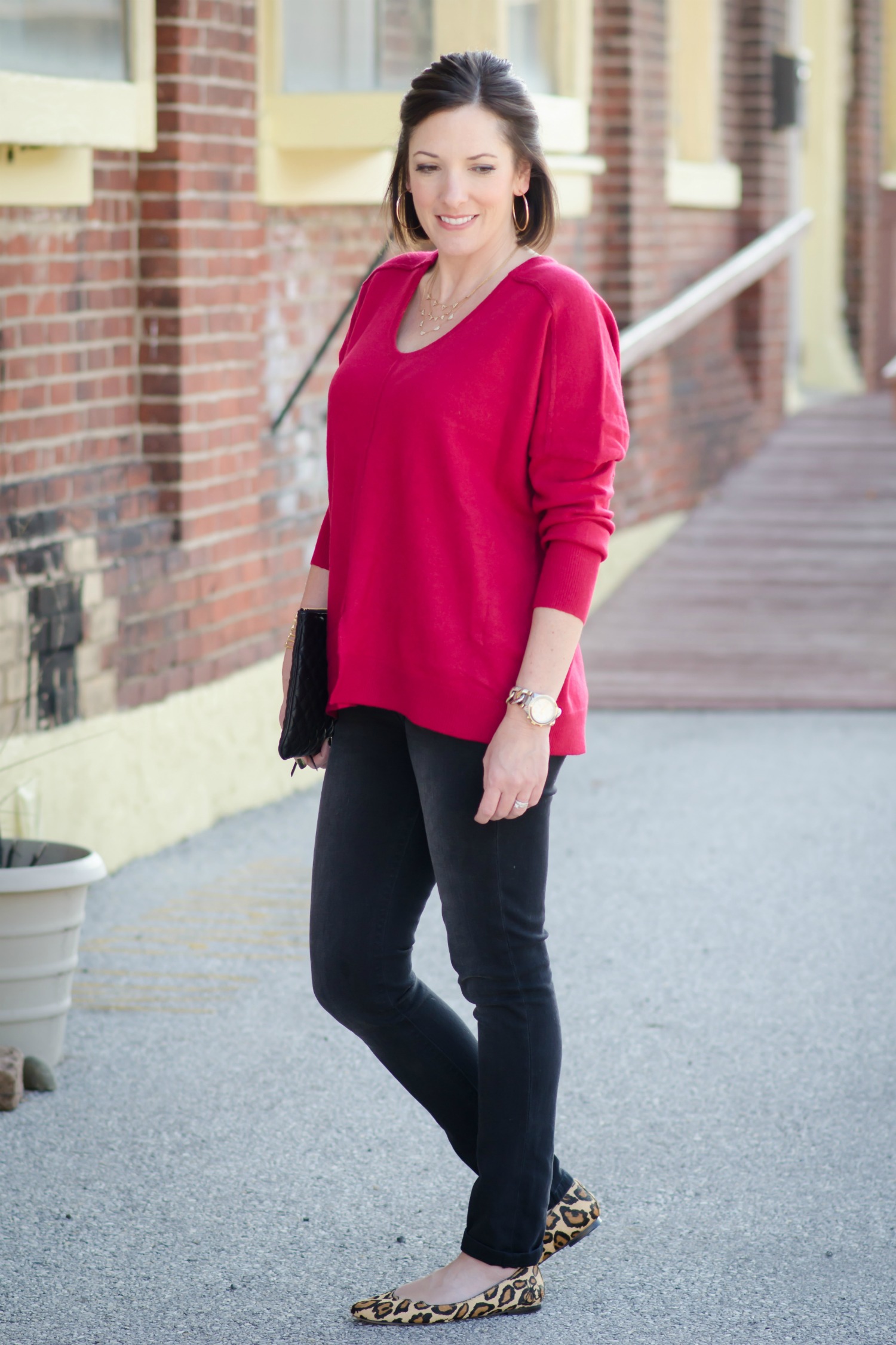 Winter Outfits for Moms: Oversized Red Sweater with Black Jeans and Leopard Flats or Leopard Pumps