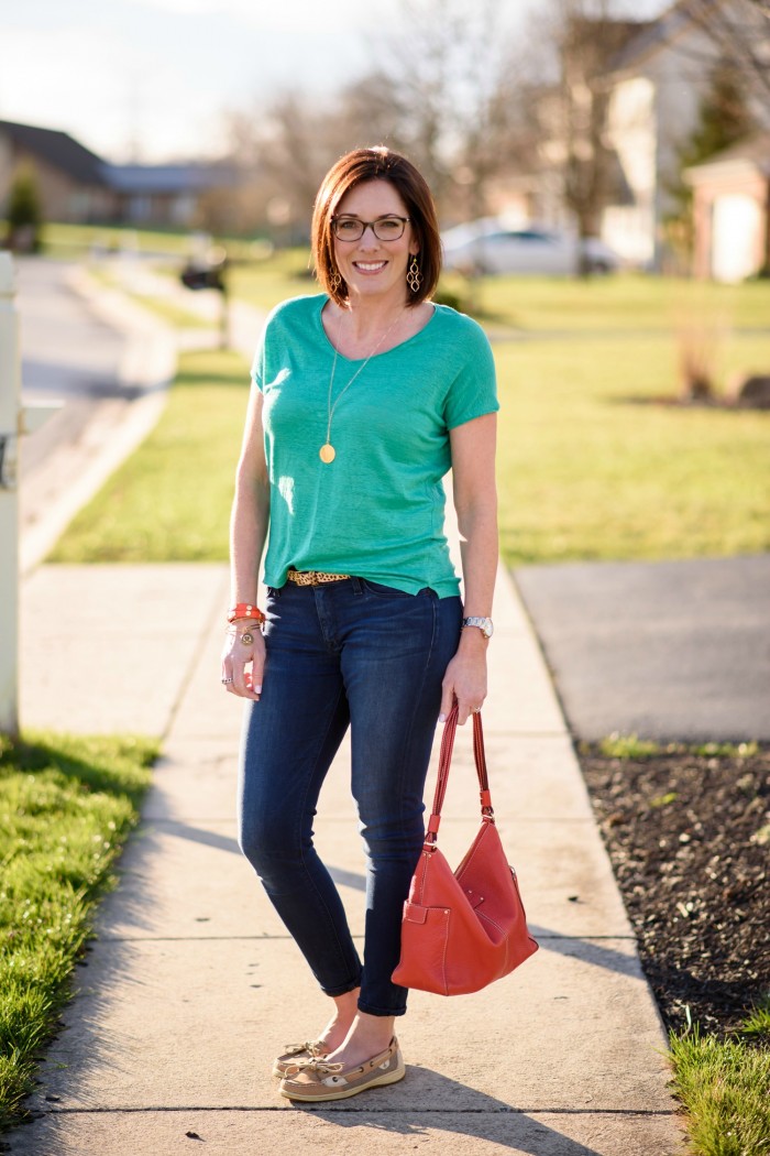 Kelly Green with Dark Denim and boat shoes... a classic spring outfit. The pop of coral and gold accessories make the outfit!