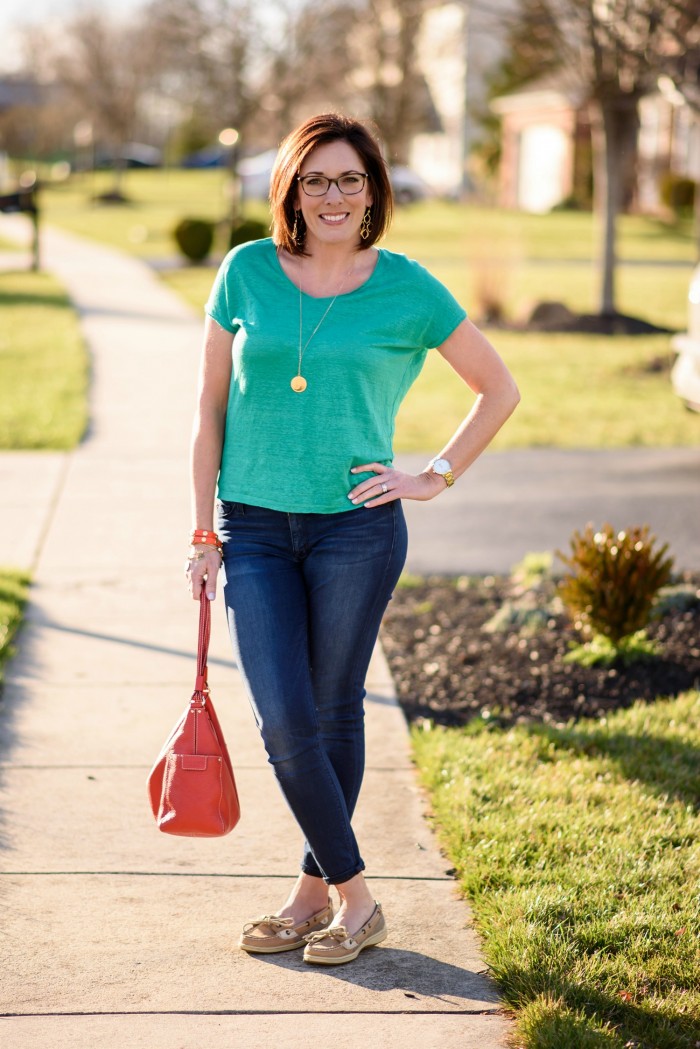 Spring Outfit Inspo: Kelly Green with Dark Denim and boat shoes with gold accessories and pops of coral