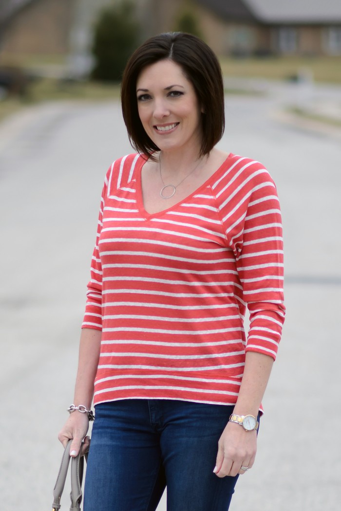 Casual Spring Outfit: Striped V-Neck Pullover with Cropped Skinnies & Converse