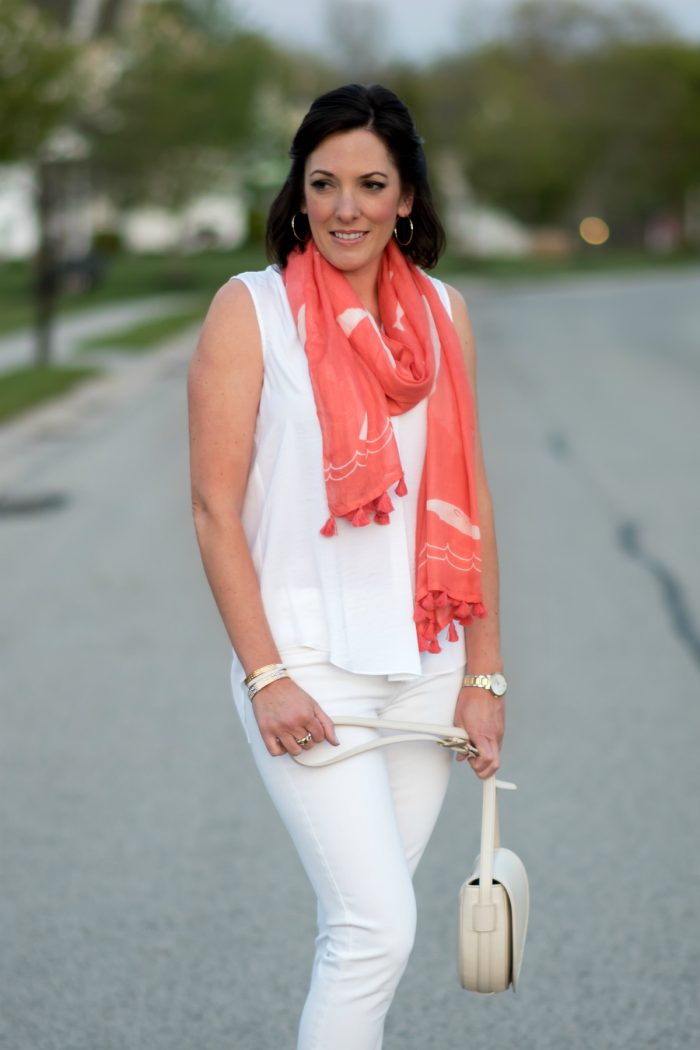 Jo-Lynne Shane wearing LOFT coral whale scarf with white shirred blouse and white skinny jeans.
