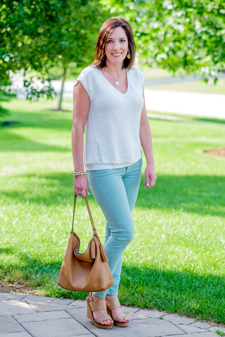 Styling a mint jeans outfit with Lucky Brand mix stitch sweater in ivory. Cognac wedge sandals and hobo handbag complete the look!