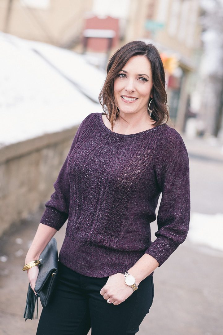 New Year's Eve party outfit with plum sequined pullover
