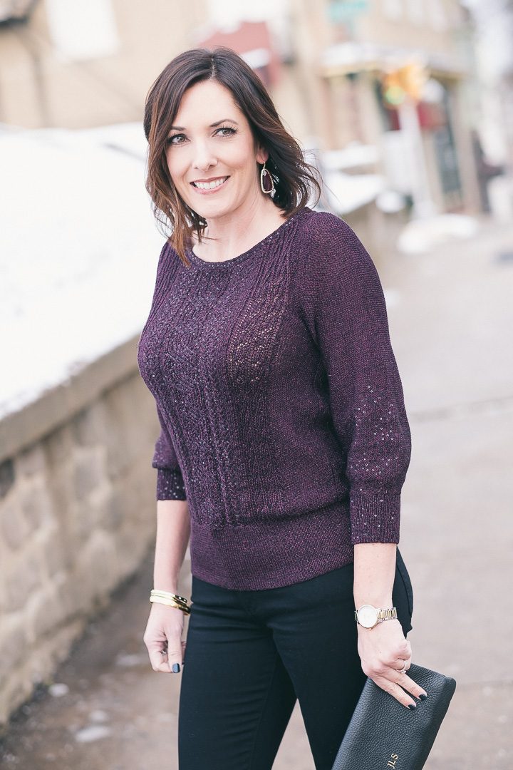New Year's Eve party outfit with plum sequined pullover and Kendra Scott Lyn Drop Earrings