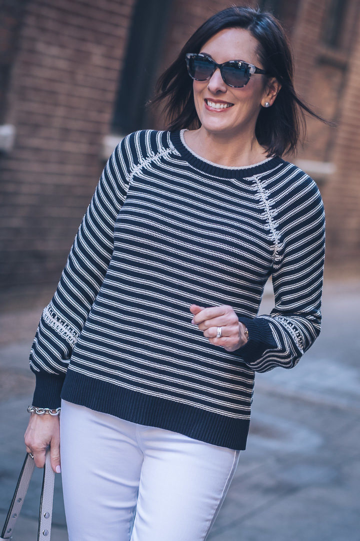 Jo-Lynne Shane wearing Loft striped whipstitched sweater, ultra white Paige Verdugo ankle skinny jeans, Vince Camuto booties, and Rebecca Minkoff Darren shoulder bag with Maui Jim Moonbow sunnies. #momstyle #springfashion
