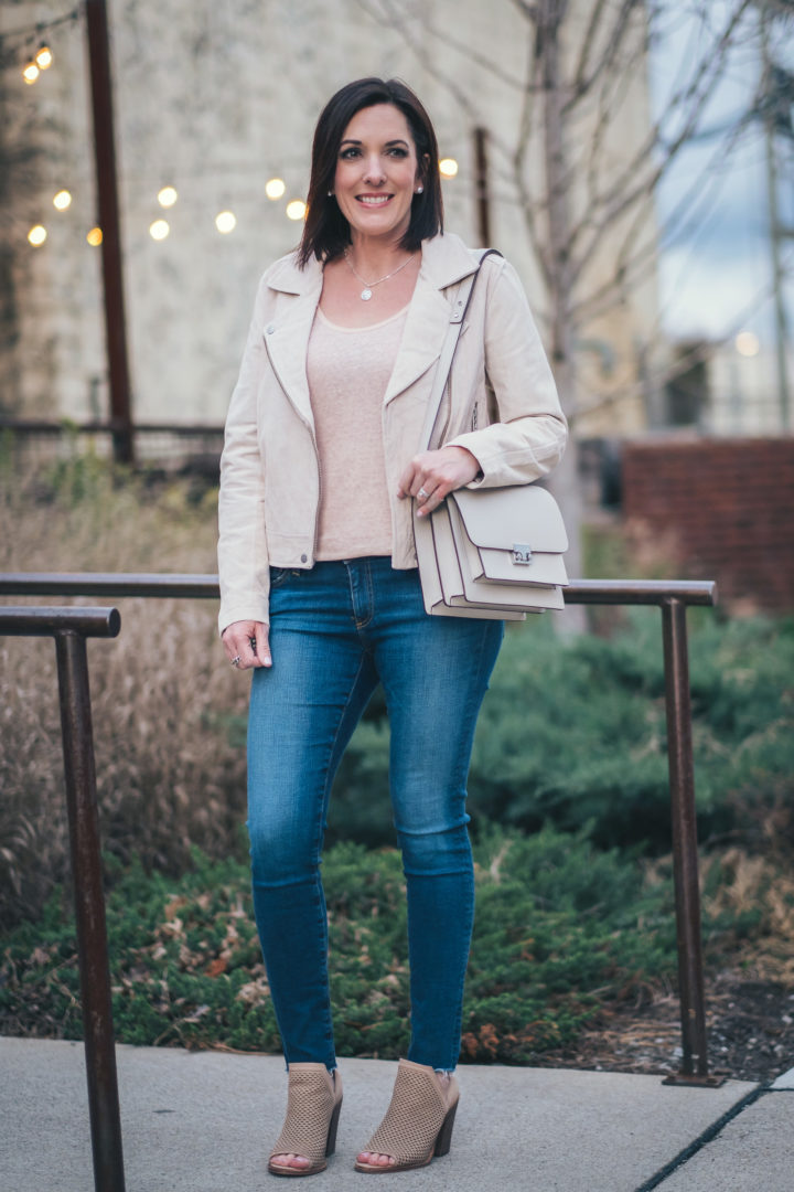 22 Days of Spring Fashion | Spring Outfit Ideas | BlankNYC suede moto jacket with AG raw hem legging ankle jeans, Vince Camuto Kensa peep-toe booties, and Loeffler Randall minimal rider leather satchel. Jo-Lynne Shane