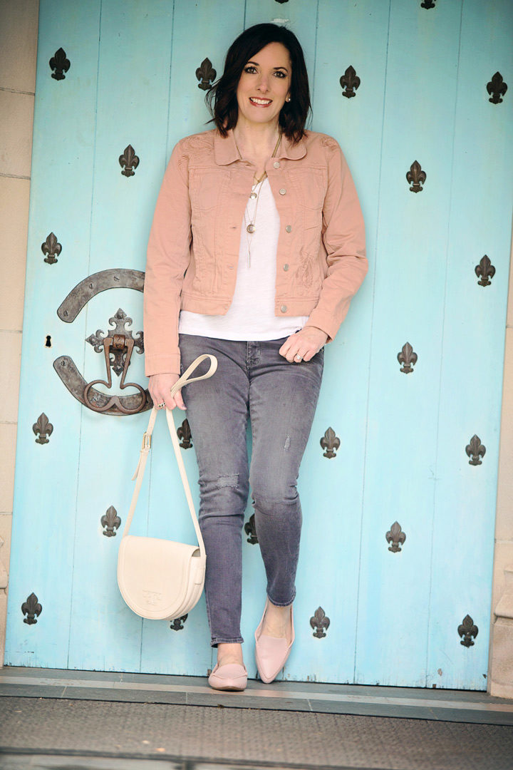 Spring Outfit with LOFT Paisley Embroidered Denim Jacket, white Madewell Whisper Soft Pocket Tee, grey Hudson skinny jeans, pink Me Too Audra Loafer Flats, Lucky Brand Openwork Layer Necklace, and Tory Burch Serif T Saddle Bag in New Ivory