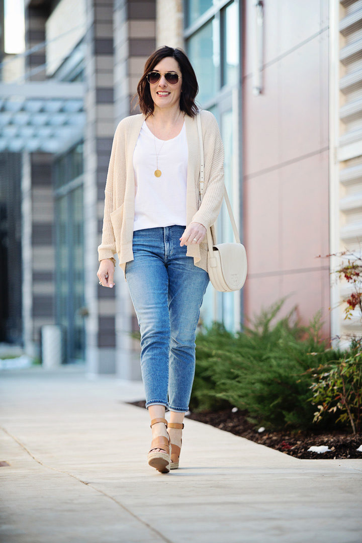 I love the light neutral color palette in this outfit, and the combination of textures keeps it from being too plain. Wearing Look by M knit cardigan with Everlane tee, Citizens Rocket crop jeans, and Treasure & Bond Sannibel wedge sandals. #springoutfit