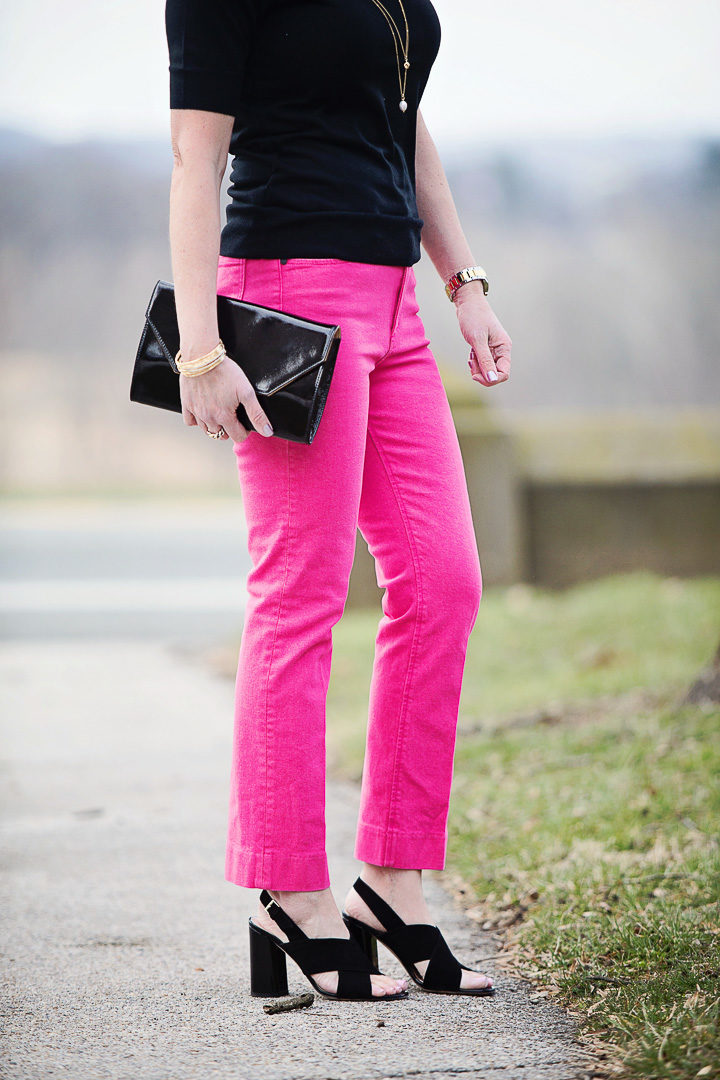 22 Days of Spring Fashion | Spring Outfit | Fashion for Women Over 40 | Jo-Lynne Shane wearing Rag & Bone Bull Pink high waist ankle cigarette leg jeans with black Ann Taylor scalloped short sleeve sweater and KSNY Christopher block heel sandals.