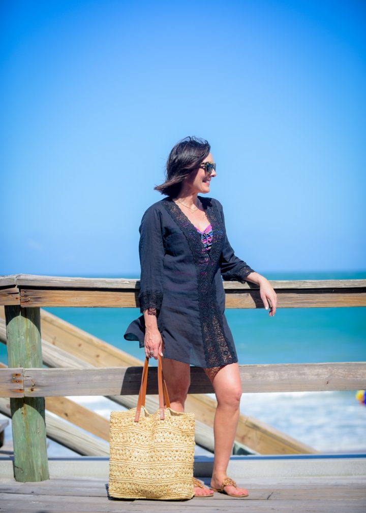 Jo-Lynne Shane wearing La Blanca Island Fare V-Neck Tunic Cover-Up with a Raffia Packable Tote