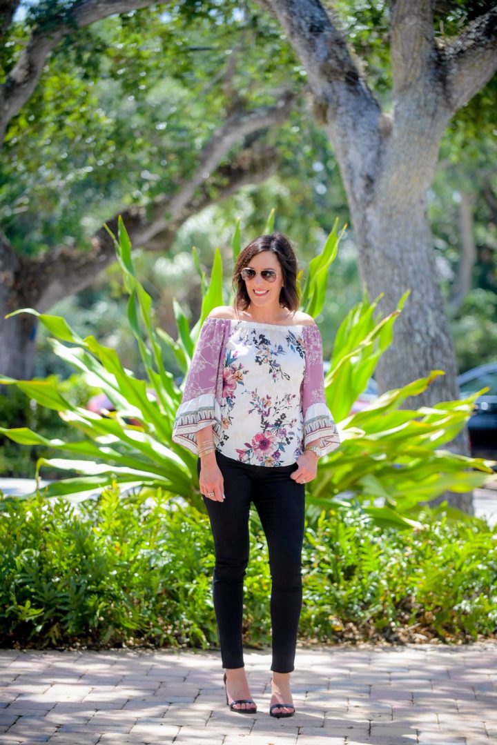 Floral & Black for Spring Fashion: This silky mixed-print off-the-shoulder top is perfect for pairing with black jeans and strappy sandals. Wear this fun spring outfit for a GNO, a date night with your man, or a graduation party! #fashion #outfit #springfashion