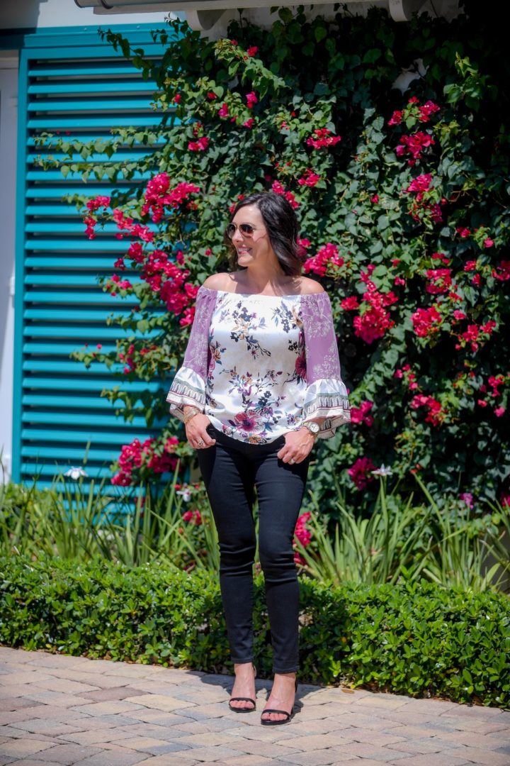 Floral & Black for Spring Fashion: This silky mixed-print off-the-shoulder top is perfect for pairing with black jeans and strappy sandals. Wear this fun spring outfit for a GNO, a date night with your man, or a graduation party! #fashion #outfit #springfashion