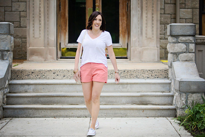Jo-Lynne Shane wearing a casual summer outfit with Old Navy Pixie chino shorts, Madewell Whisper cotton v-neck pocket tee, and Converse Shoreline kicks. #momfashion #summerstyle #outfitinspo