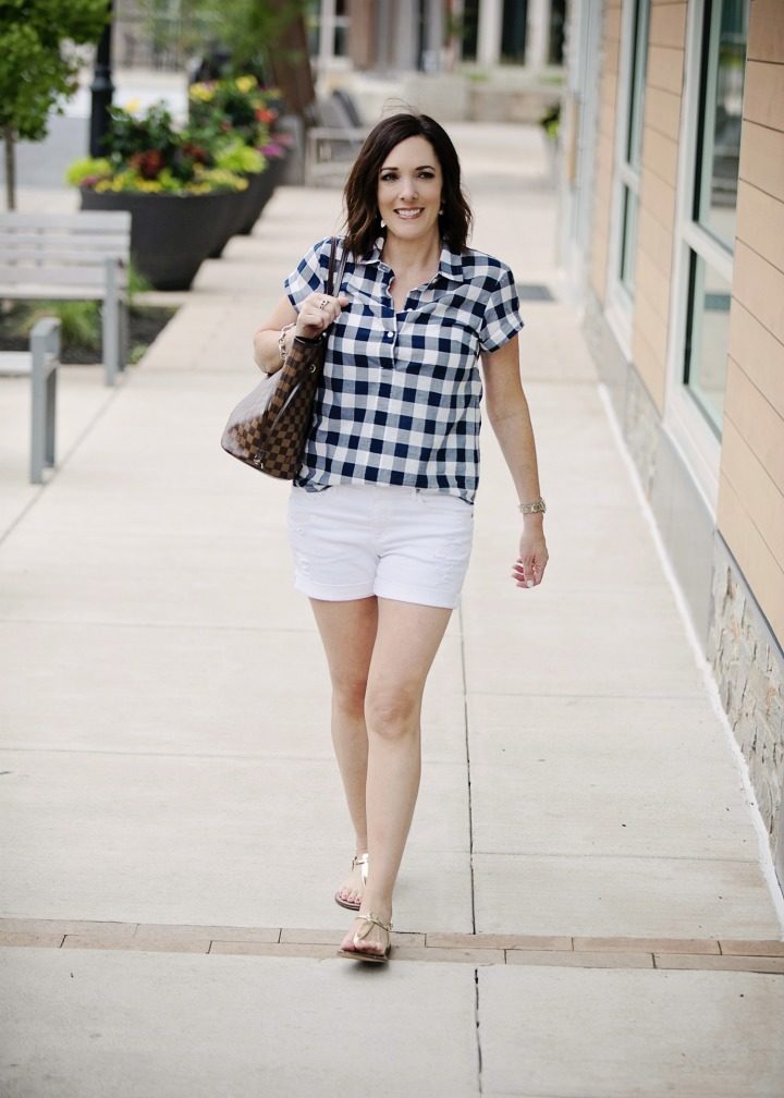 Jo-Lynne Shane wearing a casual summer shorts outfit with a gingham popover. #summerfashion