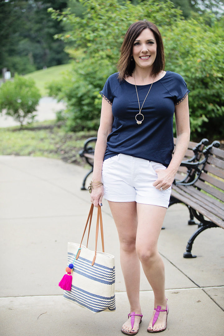 THE PERFECT STRIPED STRAW TOTE FOR SUMMER: This is a simple outfit made up of mostly wardrobe basics, but the navy striped straw tote with colorful pom-pom tassel gives it an extra fun factor that takes it to the next level.