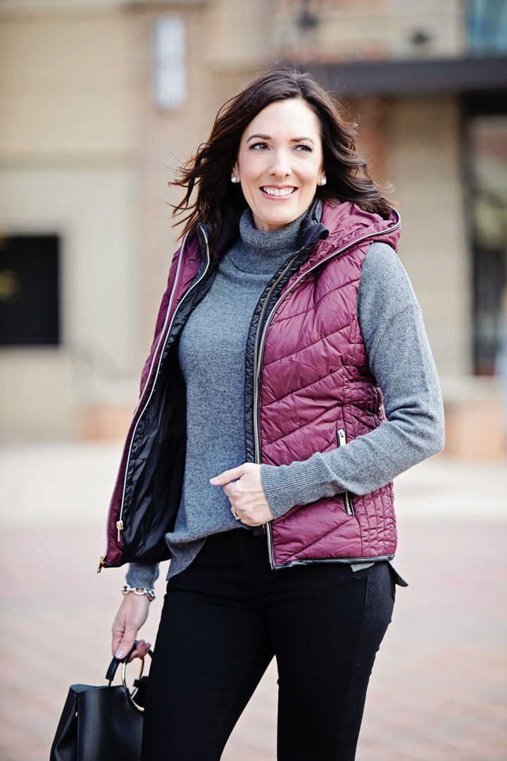 Jo-Lynne Shane wearing Marc New York Hooded Puffer Vest, Halogen Cashmere Turtleneck Sweater, with Rag & Bone Raw Hem Ankle Skinny Jeans. #falloutfit #fashion #fallfashion #outfit #fashionover40