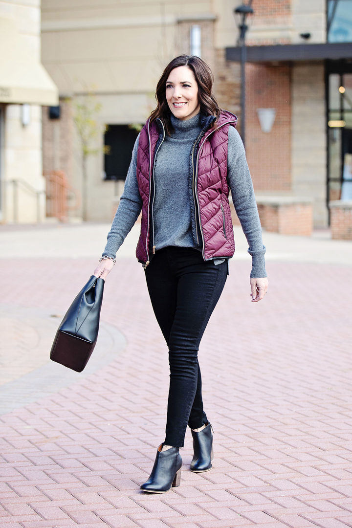 Jo-Lynne Shane wearing Marc New York Hooded Puffer Vest, Halogen Cashmere Turtleneck Sweater, BP. Lance Booties, and Rag & Bone Raw Hem Ankle Skinny Jeans. #falloutfit #fashion #fallfashion #outfit #fashionover40
