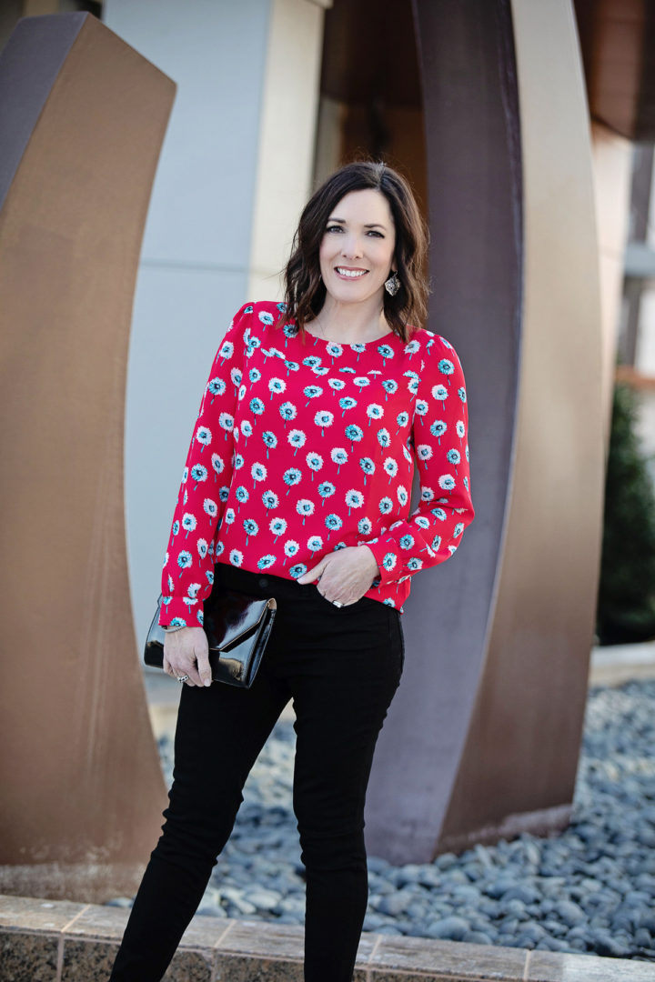 Valentine's Day / Galentine's Party Look: Jo-Lynne Shane wearing J.Crew Printed boatneck top with 9" high-rise button fly skinny jeans, Stuart Weitzman black suede pumps, and Kendra Scott Kirsten Drop Earrings | Fashion Over 40 | Winter Outfit Ideas #fashion #womensfashion #outfitinspo