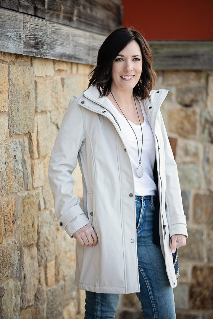 Jo-Lynne Shane wearing Calvin Klein Hooded Trench Coat with BlankNYC Classic Stretch Jeans and Lucky Brand Modern Opulence Gunmetal-Tone Pave Agate Necklace