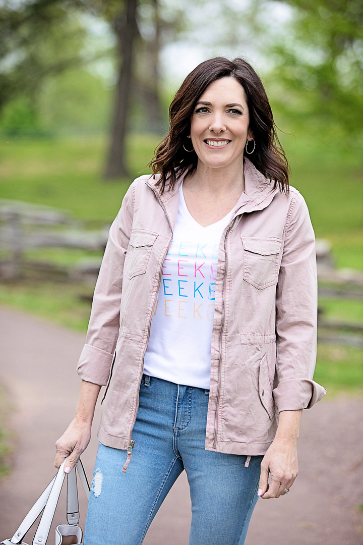 Budget-friendly spring weekend style from Kohls with destructed skinny jeans, graphic tee, and pink utility jacket.