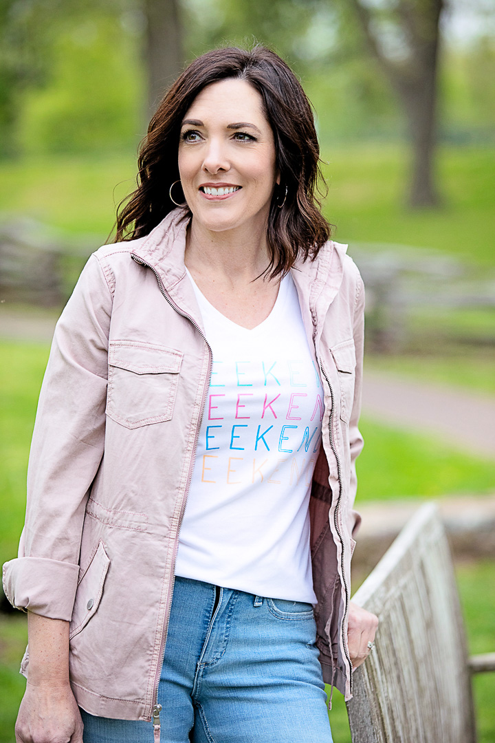 Budget-friendly spring weekend style from Kohls with destructed skinny jeans, graphic tee, and pink utility jacket.