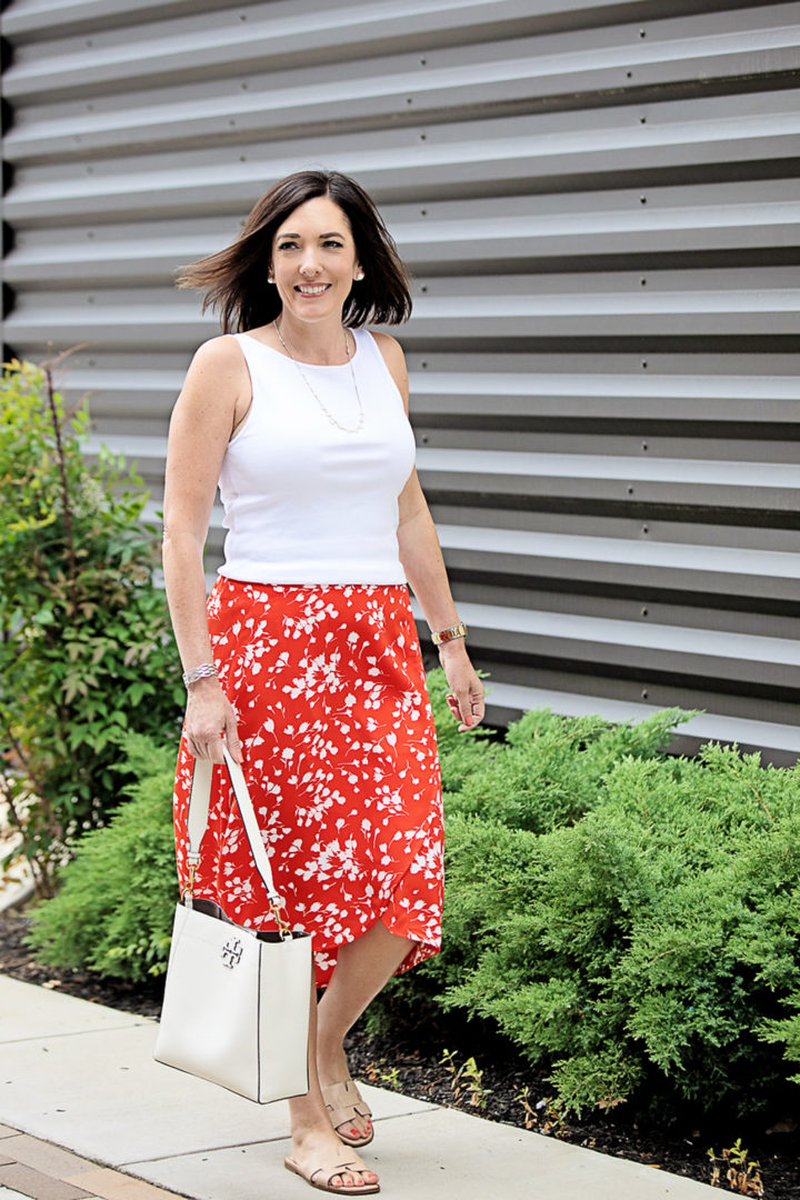 Summer Midi Skirt Outfit with J.Crew Factory Faux-Wrap Pull-On Midi Skirt in Fantome Floral Ivory Red Print | also wearing: J.Crew Factory Open-Neck Cami Top and Nine West Gianna Cut-Out Slides | Fashion over 40 with Jo-Lynne Shane