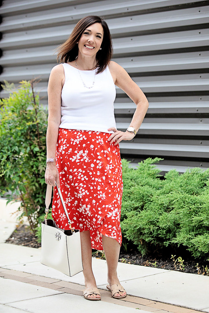 Summer Midi Skirt Outfit with J.Crew Factory Faux-Wrap Pull-On Midi Skirt in Fantome Floral Ivory Red Print | also wearing: J.Crew Factory Open-Neck Cami Top and Nine West Gianna Cut-Out Slides | Fashion over 40 with Jo-Lynne Shane