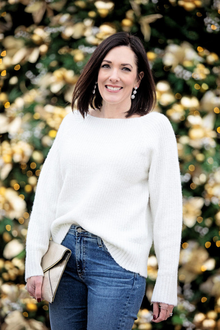 Jo-Lynne Shane wearing a casual New Year's Eve outfit featuring Chelsea28 Rib Metallic Sweater and pave drop earrings