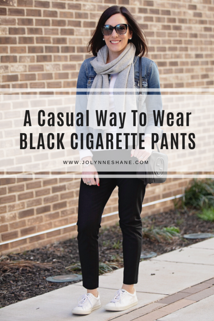 Jo-Lynne Shane shares a casual way to wear black cigarette pants, featuring the Banana Republic Devon ankle pants, Veja Esplar sneakers, and a denim jacket. 