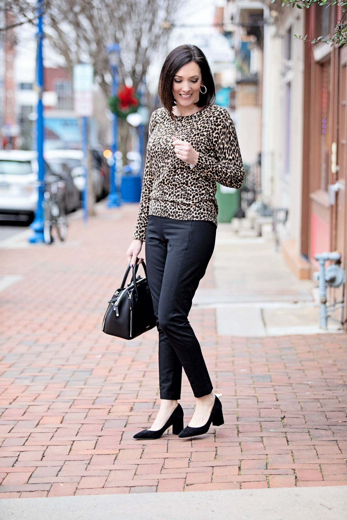 https://jolynneshane.com/wp-content/uploads/2020/02/black-pants-with-leopard-sweater-two-ways-3.jpg