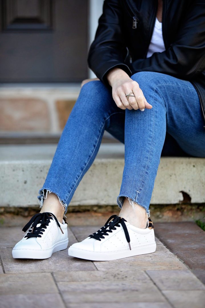 Jo-Lynne Shane wearing J.Crew Saturday sneakers with leopard calf hair detail and AG Farrah skinny ankle jeans.
