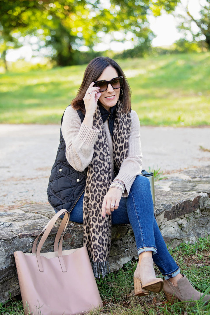 Casual Outdoor Dining Outfit for Fall with Puffer Vest and Leopard Scarf