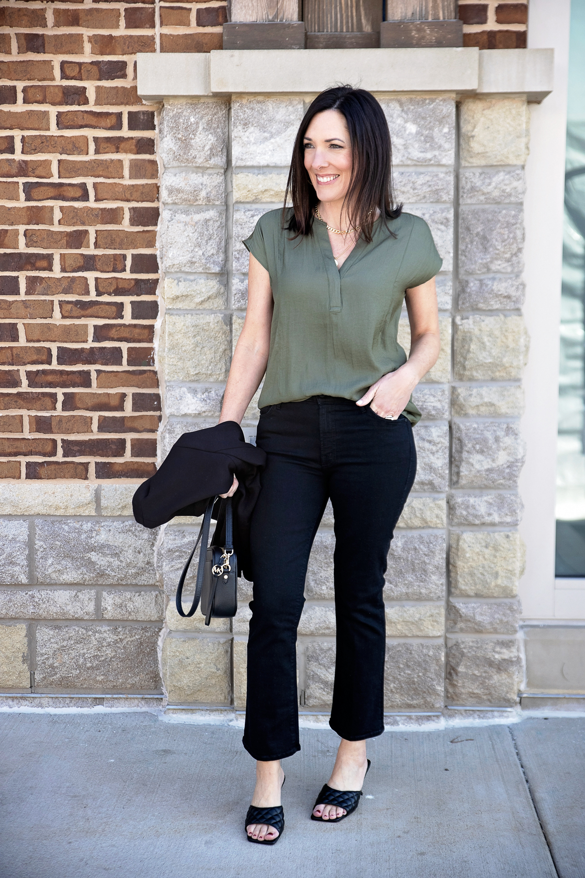 desk to dinner: black kick flares with dolman top and trendy quilted slide sandals