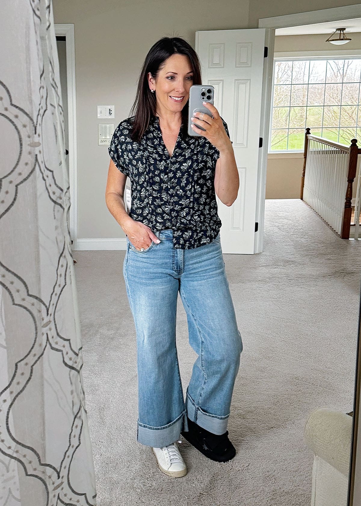 Jo-Lynne Shane wearing Treasure & Bond Allover Print Short Sleeve Top with KUT from the Kloth Meg Wide Leg Cuffed Jeans